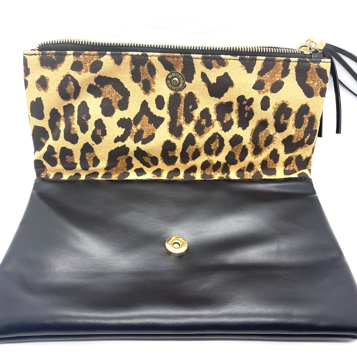 leopard printed foldover clutch featured at